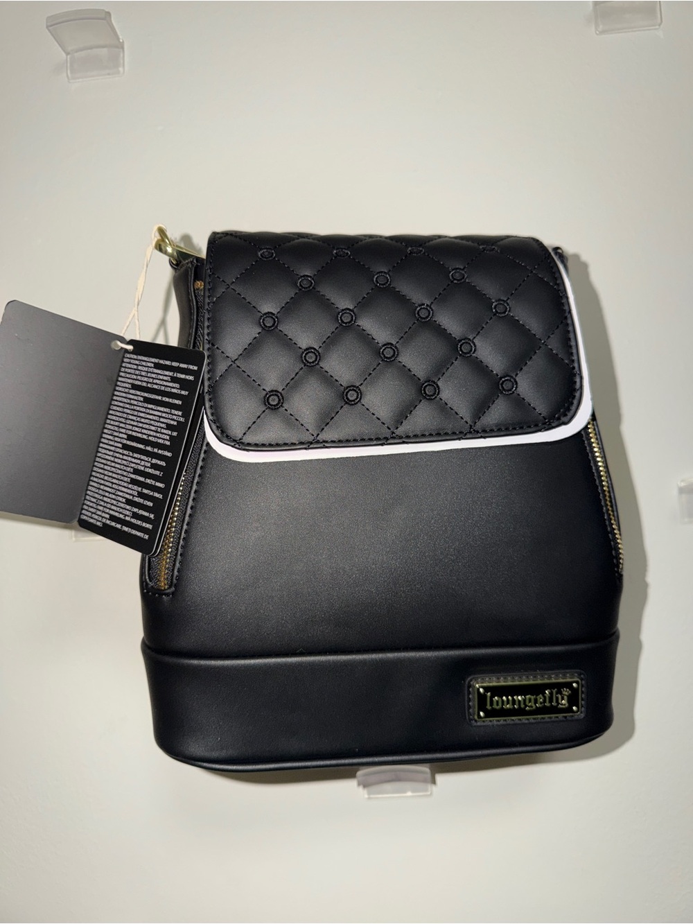 Loungefly The Lilly Black Convertible Mini Backpack & Crossbody Pin Trader Bag